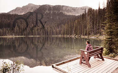 woman at lakefront with mars retrograde symbols