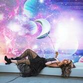 woman with moon balloon