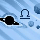 Silhouette of Planet Saturn floating in space with libra glyph