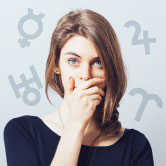 woman covering her mouth and astrology symbols