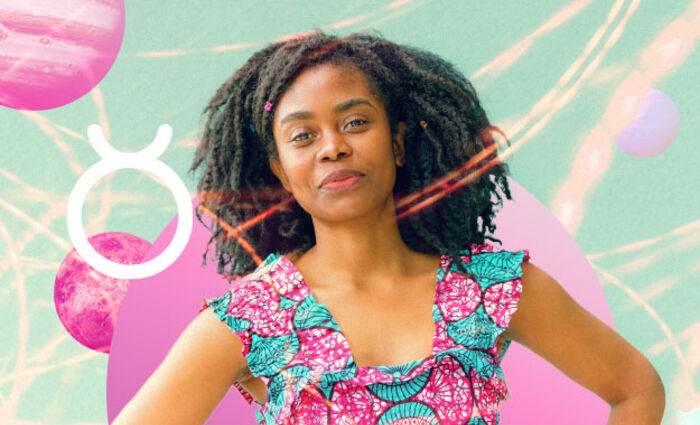 A woman in a floral top stands against a cosmic background with the symbol for Taurus in 2024.