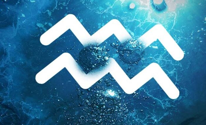 Aquarius sign floating in water
