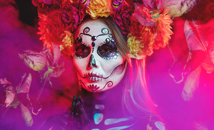 woman with traditional day of the dead face makeup