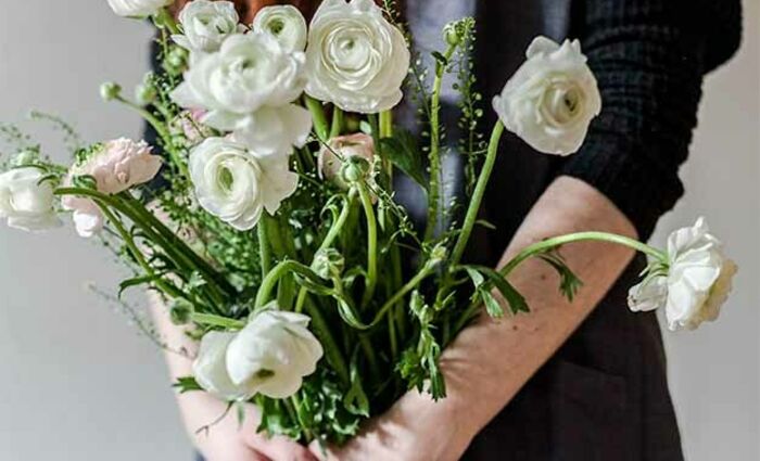 woman holding flowers