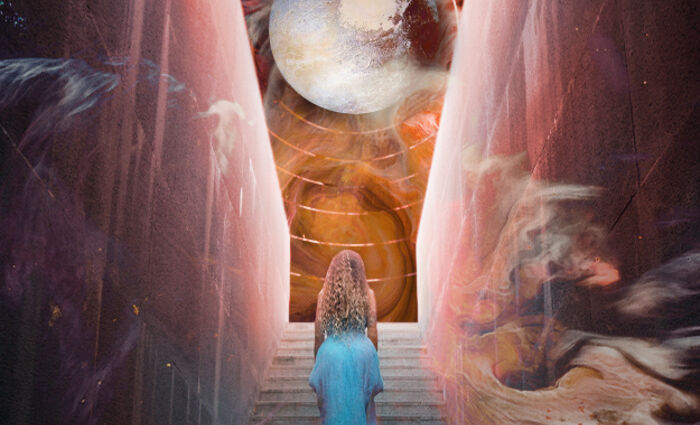 A woman in a blue dress stands on a staircase and looks up at the planet Pluto.