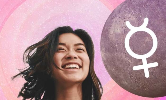 woman smiling at mercury retrograde