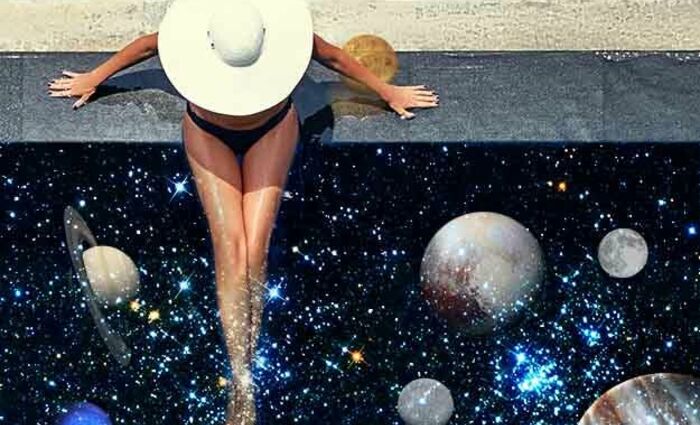 woman looking at planets