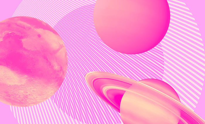 Three pink planets float against a purple striped background.