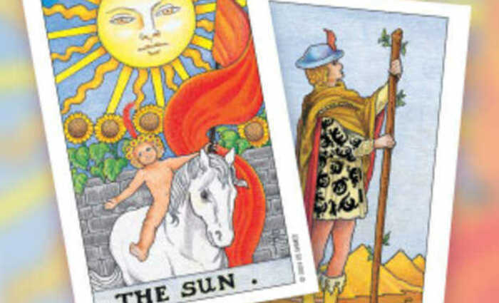 summer tarot cards the sun and page of wands