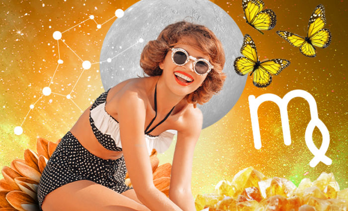 A woman in a swimsuit is surrounded by yellow butterflies for the 2023 Virgo yearly horoscope.